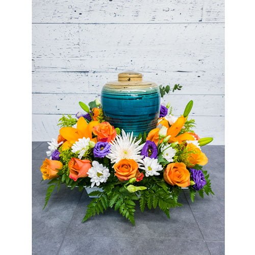 Arrangement composé de fleurs aux couleurs automnales