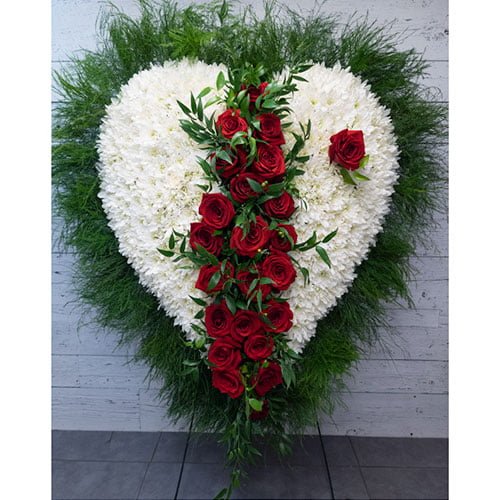 Arrangement of exotic flowers, roses and greenery