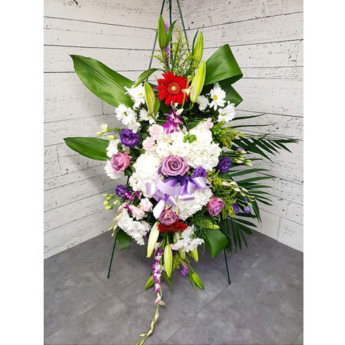 Arrangement made of white and purple flowers